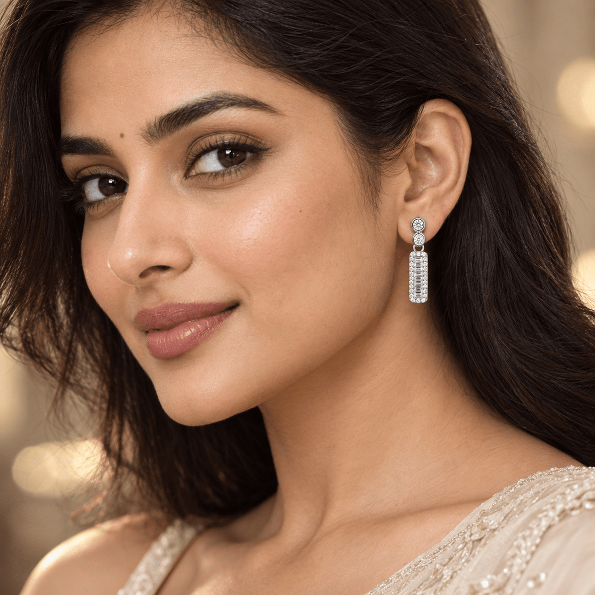 A woman wearing a 925 Silver Baguette Rectangular Halo Drop Earrings by iraura Jewels.