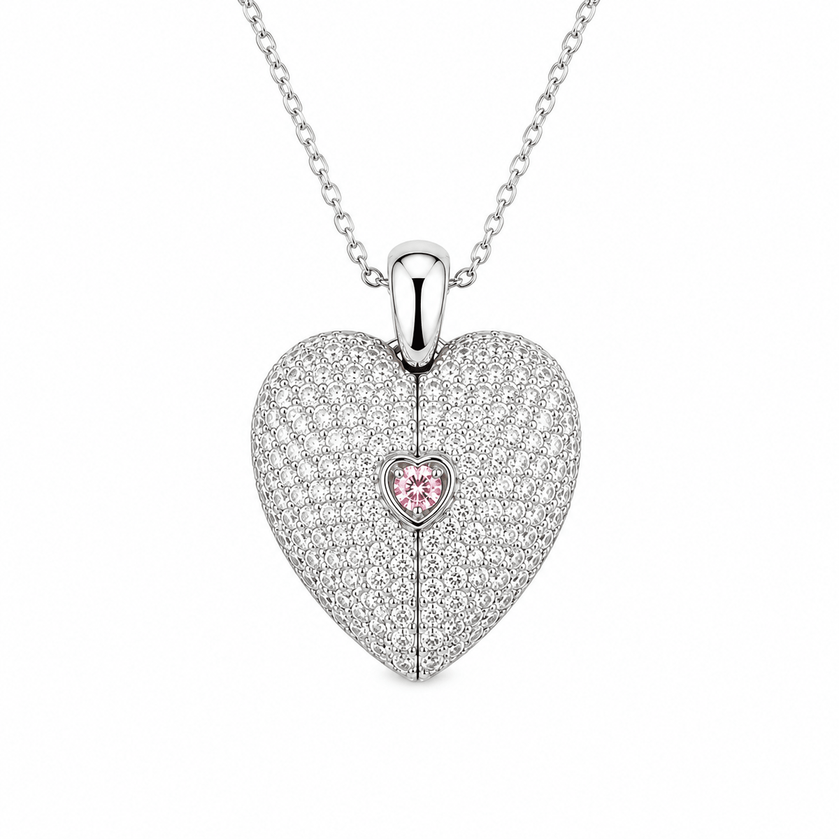 A silver heart-shaped pendant necklace paved with small clear stones, featuring a central pink heart-shaped gemstone, shown on a white background.