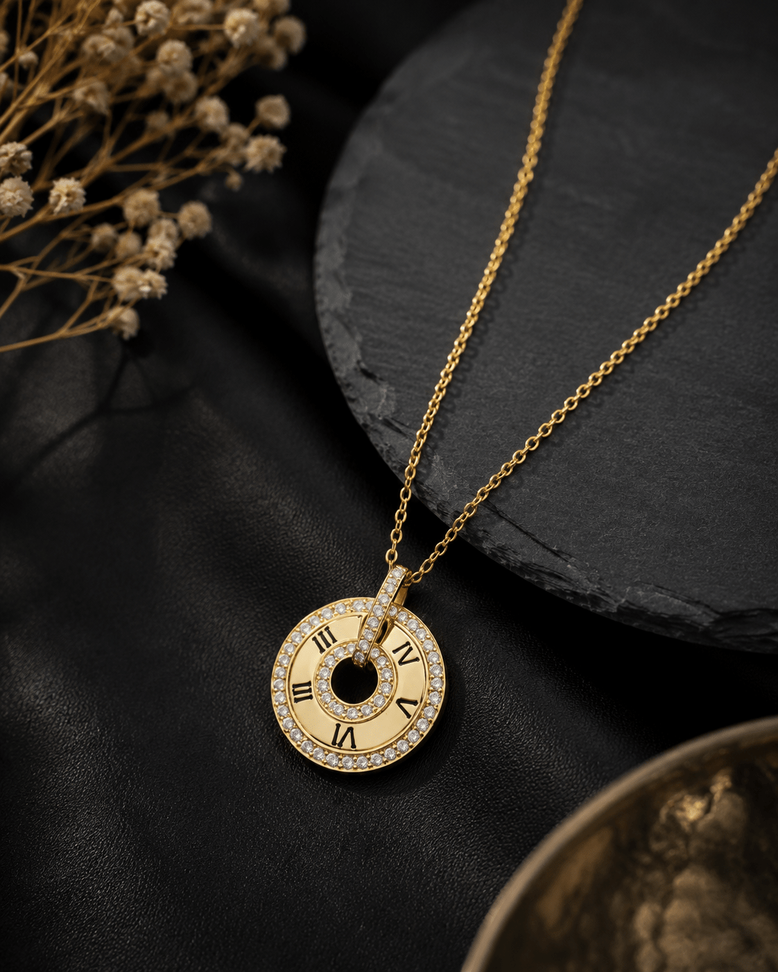 A gold pendant necklace with a clock face design, featuring Roman numerals and a pavé-set bezel. Gold Roman Clock Disc Pendant | 925 Silver by Miraura Jewels Jaipur