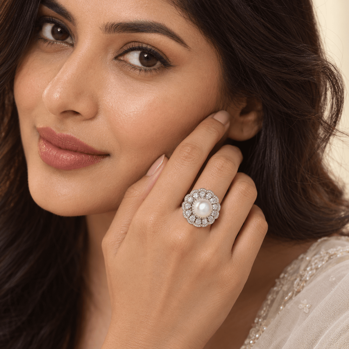 A woman wearing a Pearl & Zircon Scalloped Floral 925 Silver Ring