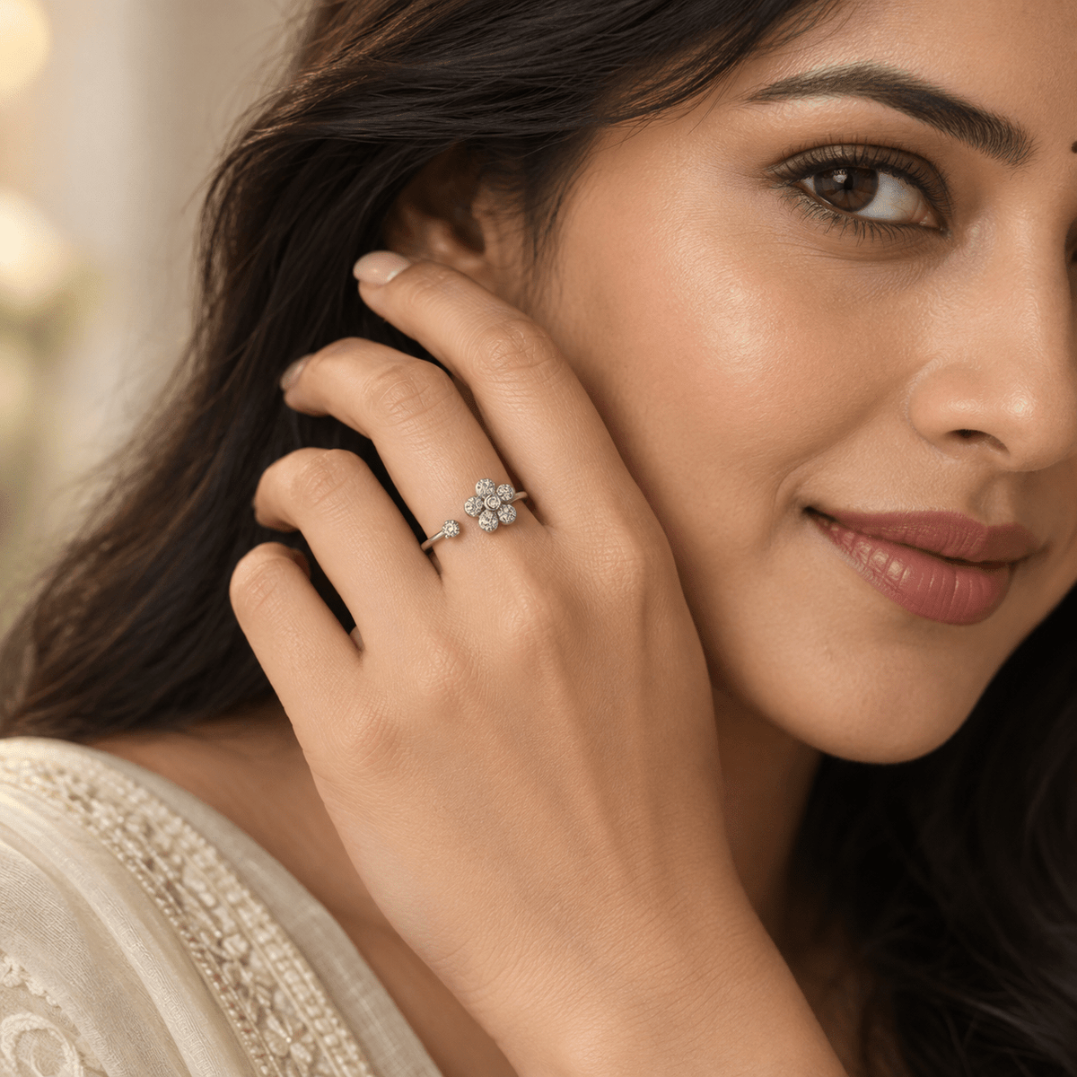 A close-up lifestyle shot of a woman wearing a delicate 925 Sterling Silver Clover Band Ring with CZ by Miraura Jewels