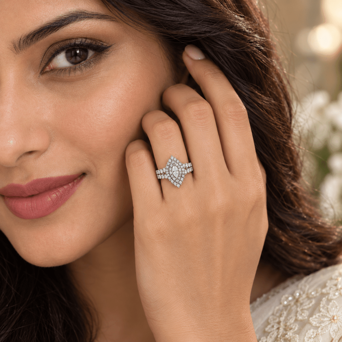 A close-up lifestyle shot of a woman wearing a 925 Silver Dazzling Marquise Halo Statement Ring by Miraura Jewels