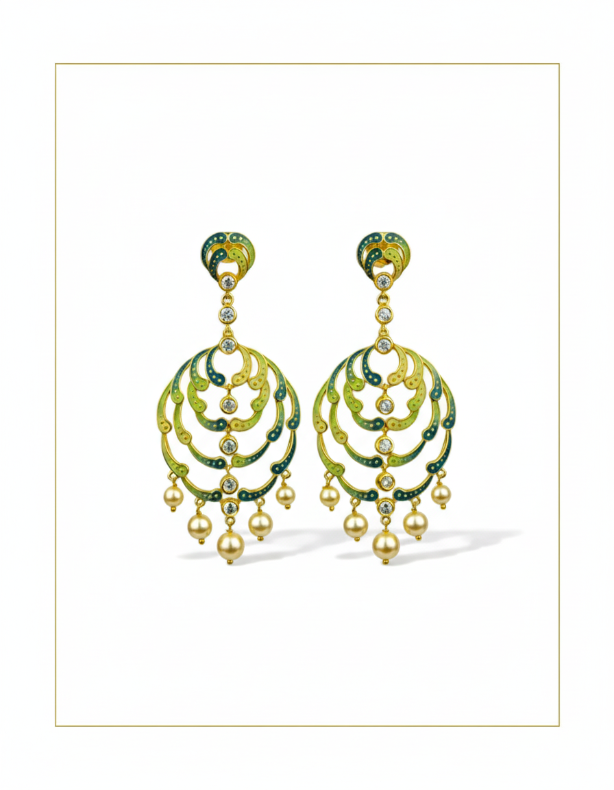Pair of green and gold earrings on a white background