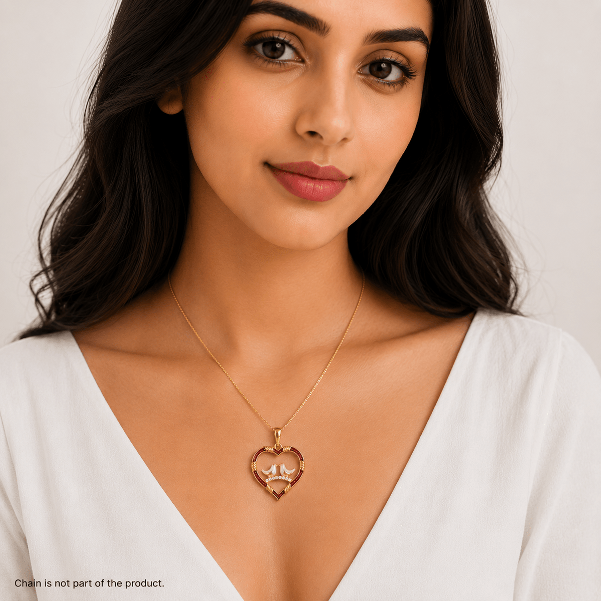 A woman wearing a delicate 925 Silver Love Birds Heart Pendant featuring a red heart and white crescent moon design. by Miraura Jewels